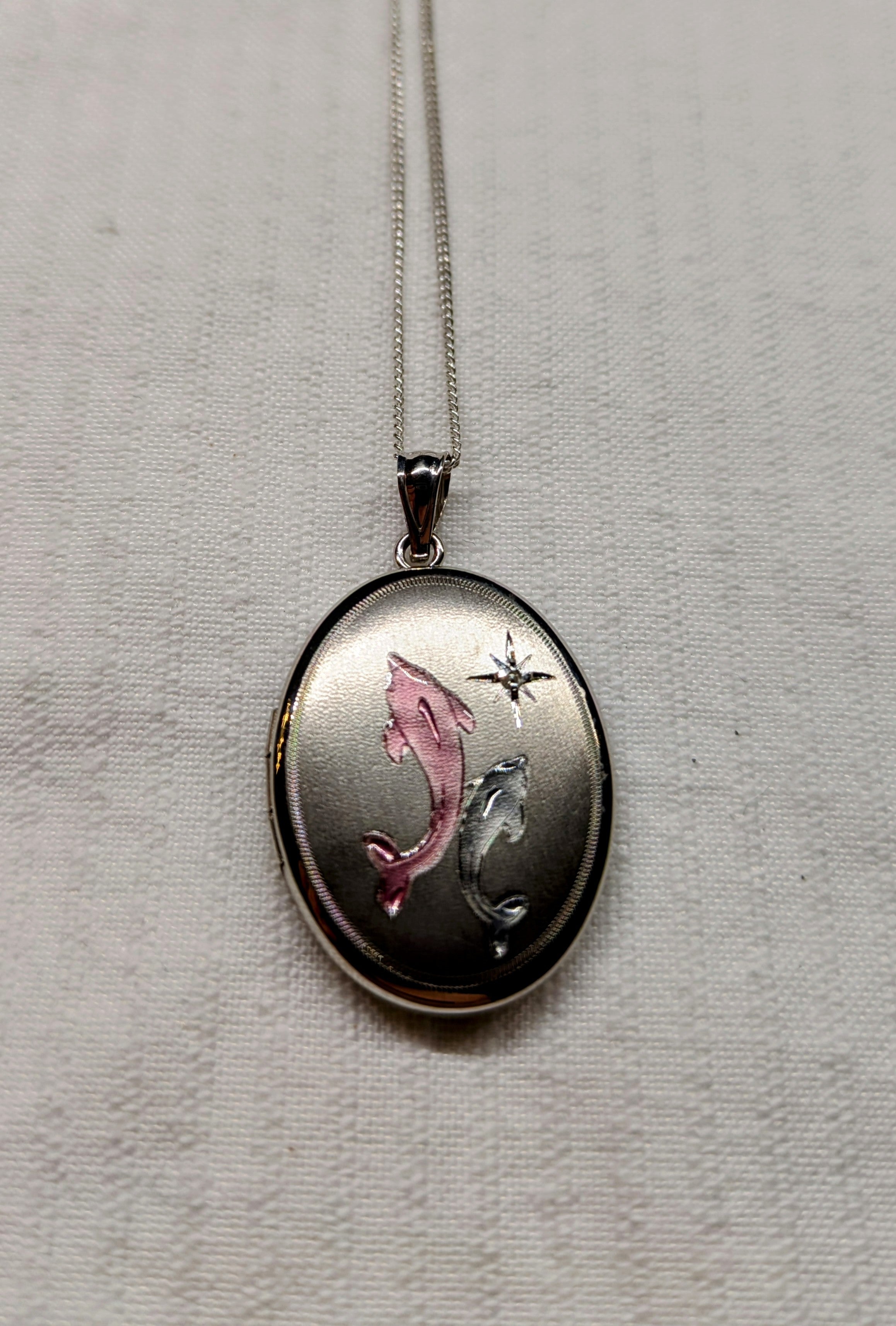 Locket with dolphins  sterling silver